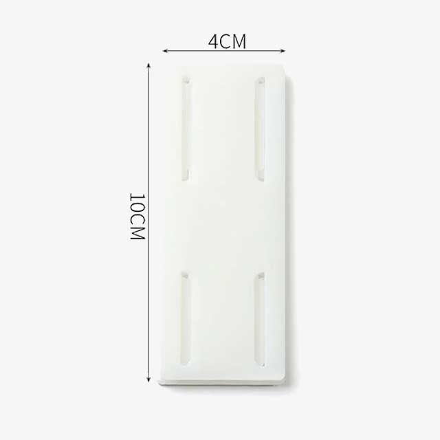 Wall-Mounted Plug Fixer – Secure and Organized Electrical Outlet Holder for Cables & Plugs