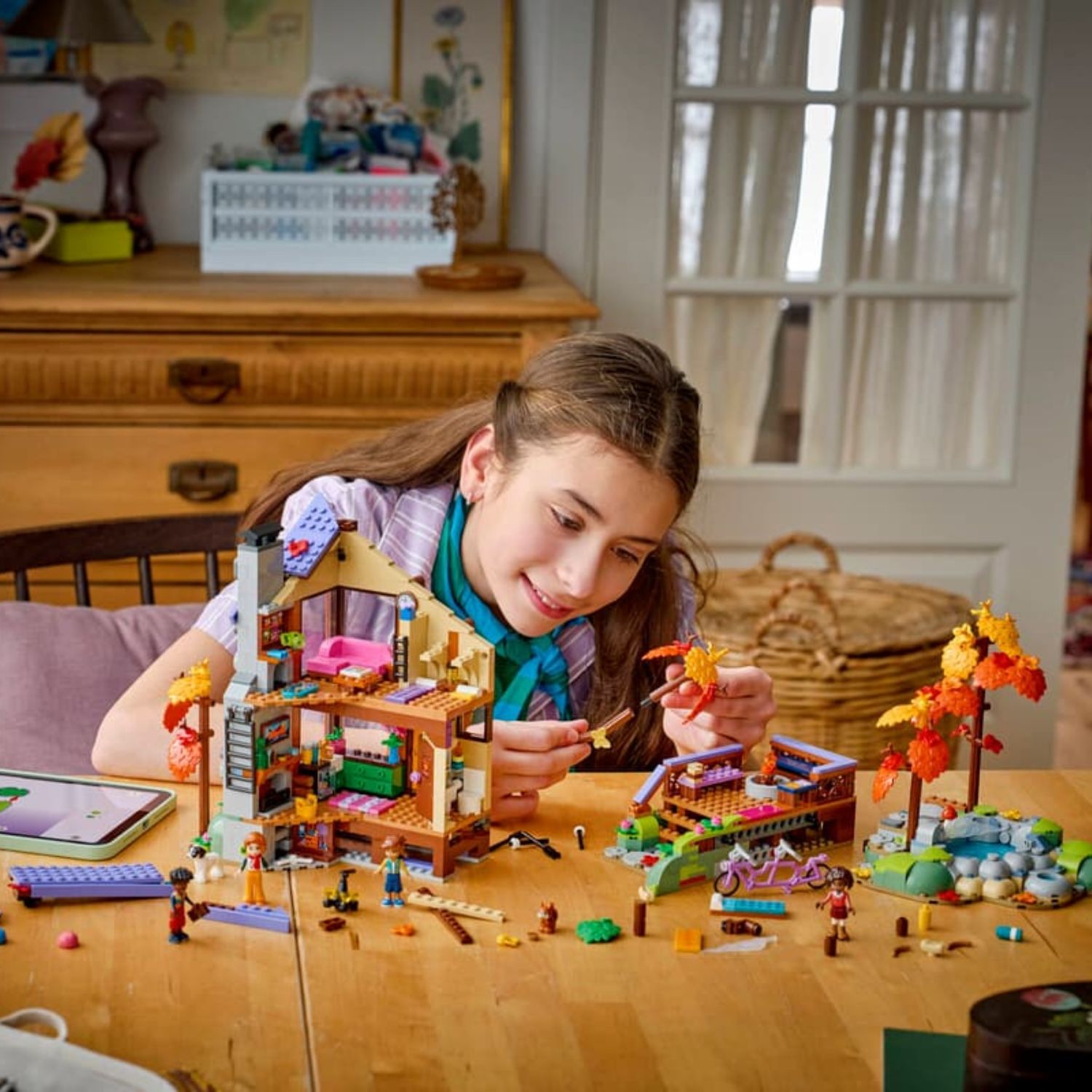 LEGO Friends 42705 Cozy Fall Forest Cabin Building Toy Set, 1229 Pieces for Boys and Girls Ages 9 Years and Above